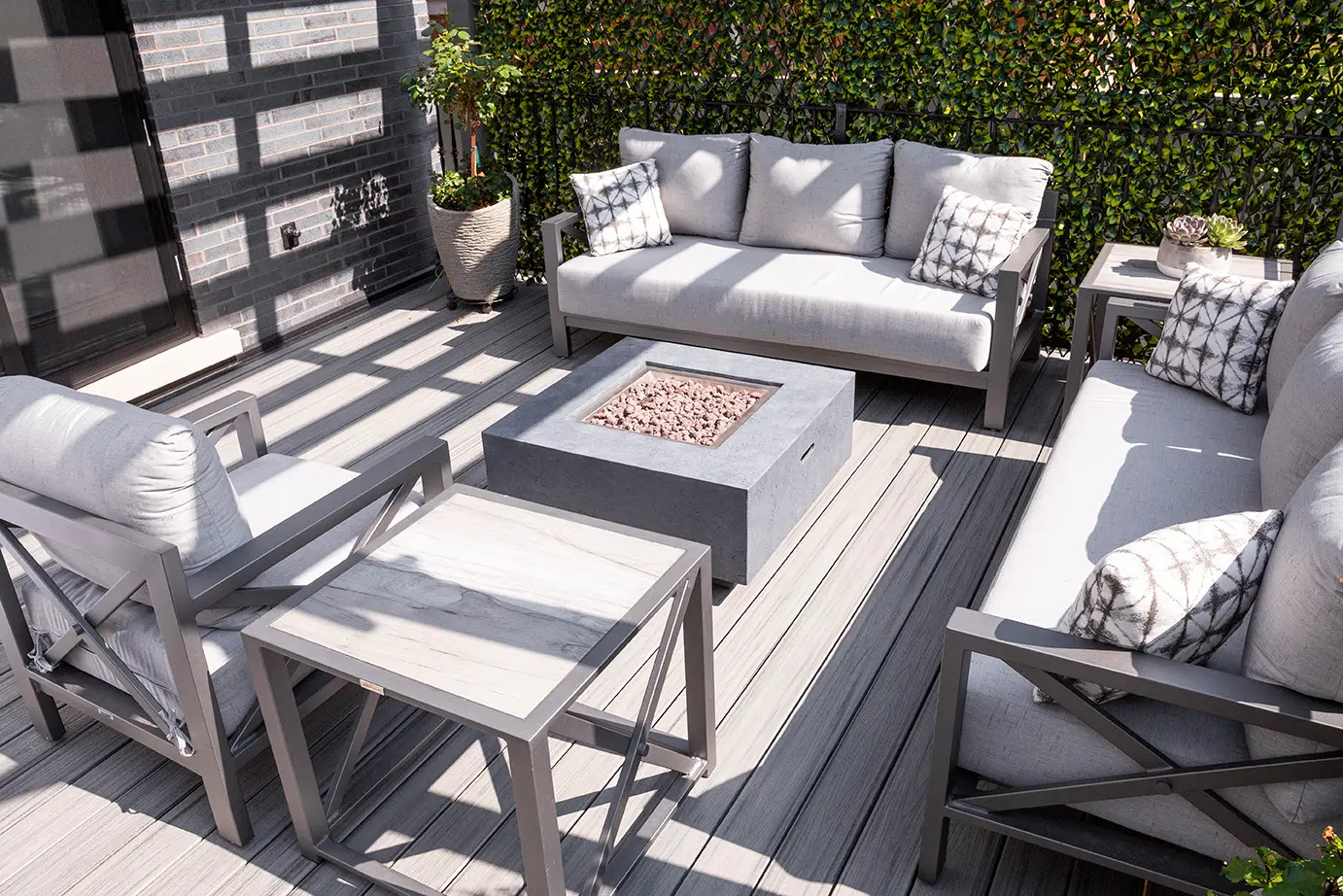 DecoScape outdoor seating area with modern patio furniture arranged for comfort and style in a Florida backyard.
